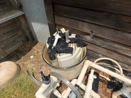Pool filter torn down for cleaning and repair in the Oklahoma City area